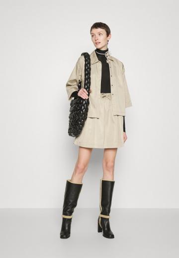 Юбка с накладными карманами