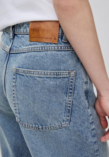 Клешеные джинсы