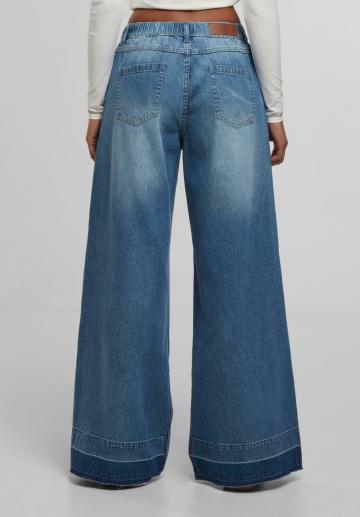 Клешеные джинсы