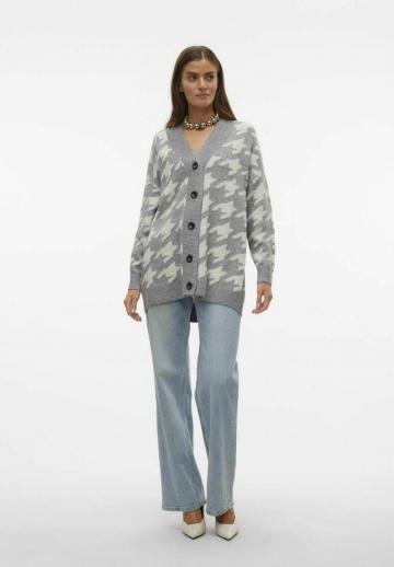 Длинный жилет