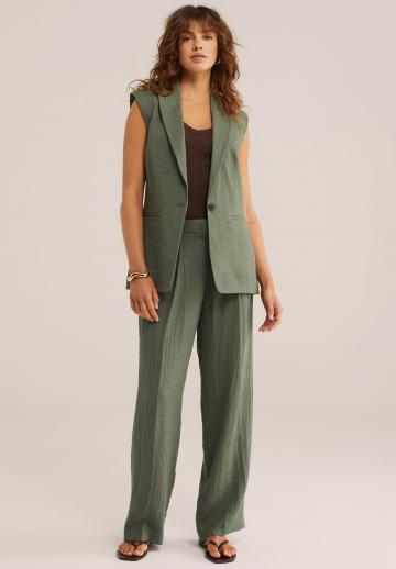 Длинный жилет