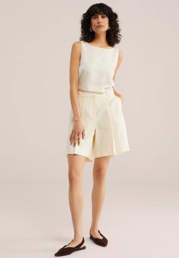 Блузка без рукавов