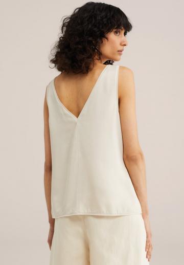 Блузка без рукавов