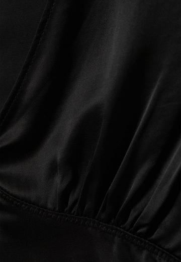 Блузка без рукавов