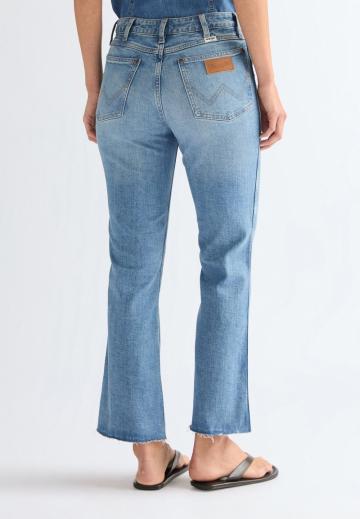 Клешеные джинсы