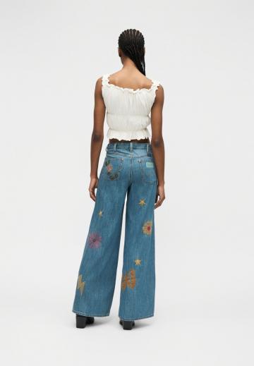 Клешеные джинсы