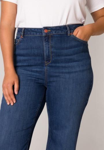 Клешеные джинсы