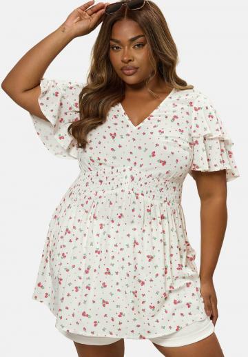 Длинная блузка