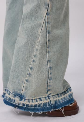 Клешеные джинсы