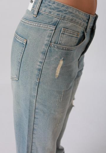 Клешеные джинсы