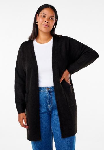 Длинный жилет