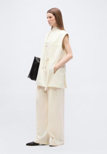 Длинный жилет