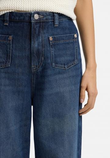 Клешеные джинсы