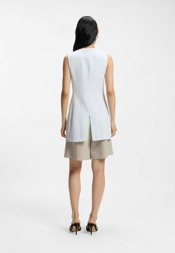 Длинный жилет