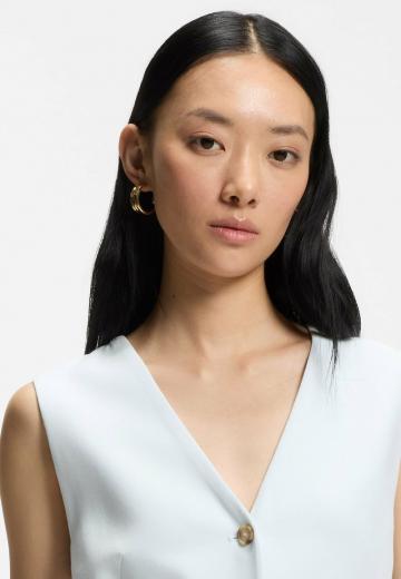 Длинный жилет