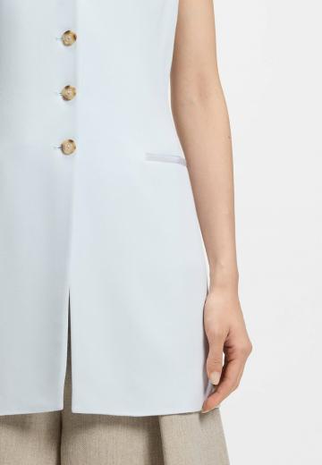 Длинный жилет