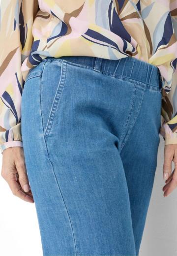 Клешеные джинсы