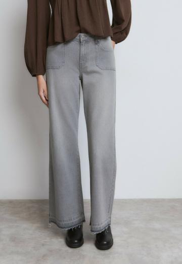 Клешеные джинсы