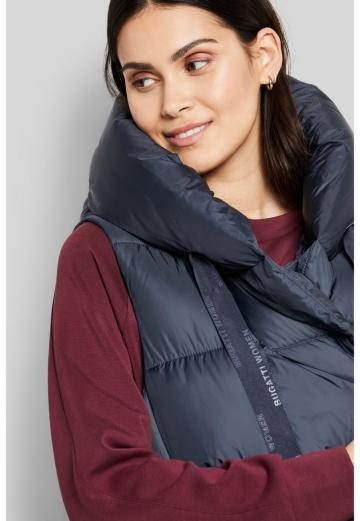 Длинный жилет