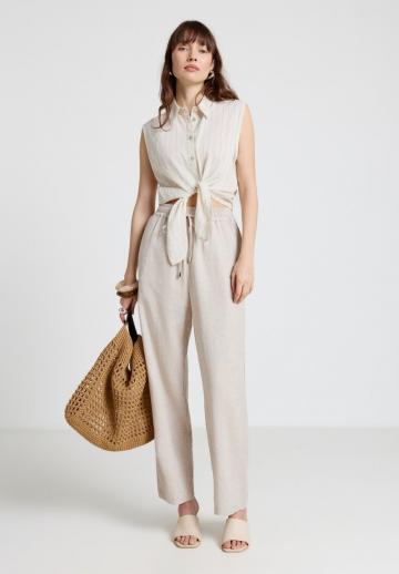 Блузка без рукавов