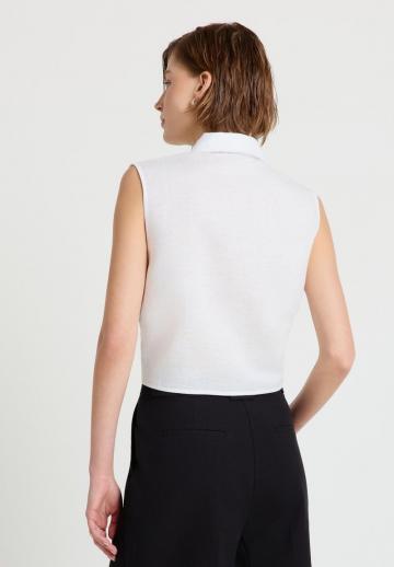 Блузка без рукавов