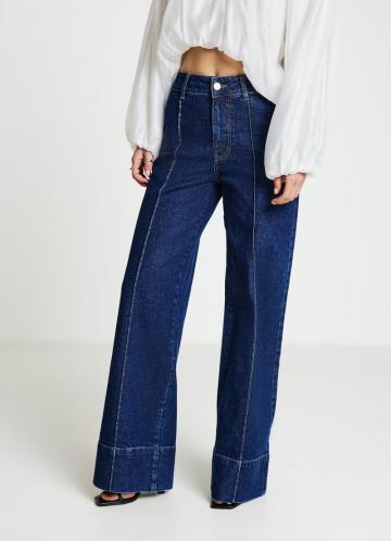 Клешеные джинсы