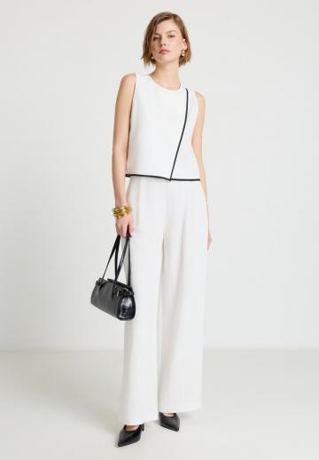 Блузка без рукавов