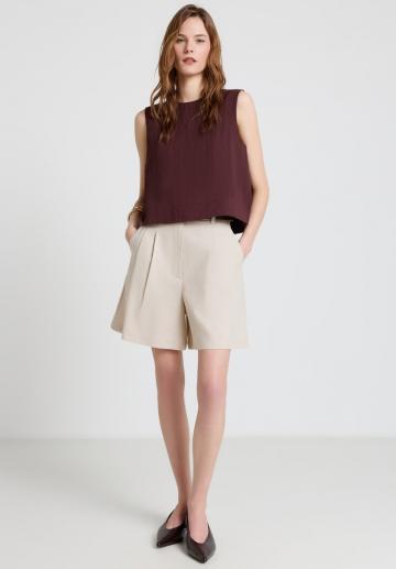 Блузка без рукавов