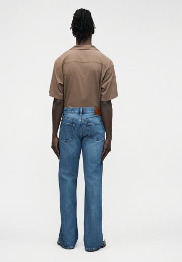 Клешеные джинсы