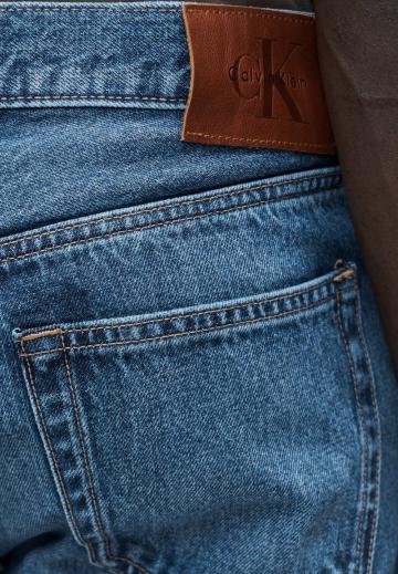 Клешеные джинсы