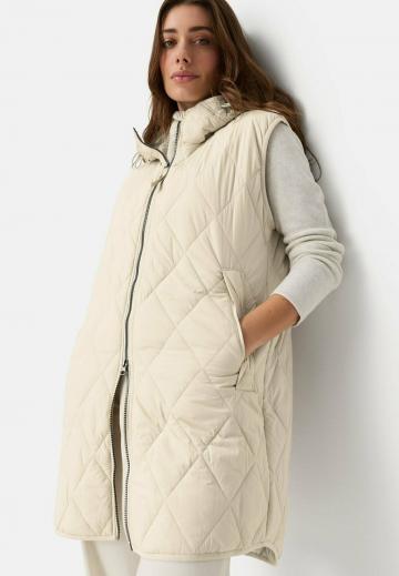 Длинный жилет