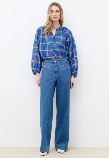 Клешеные джинсы