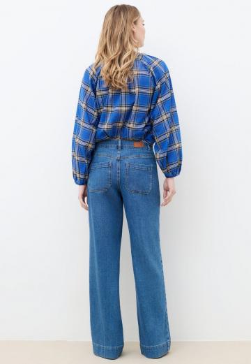 Клешеные джинсы