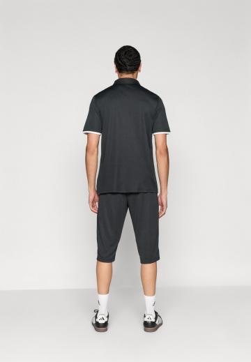 Спортивные бриджи