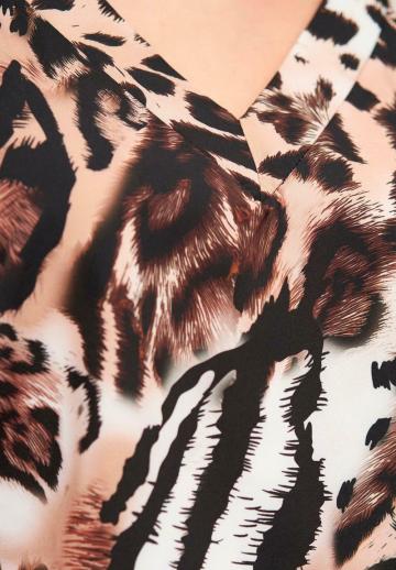 Блузка без рукавов