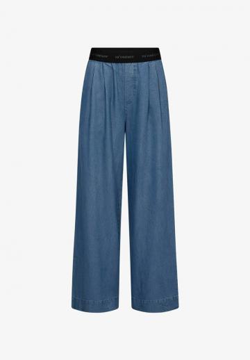 Клешеные джинсы