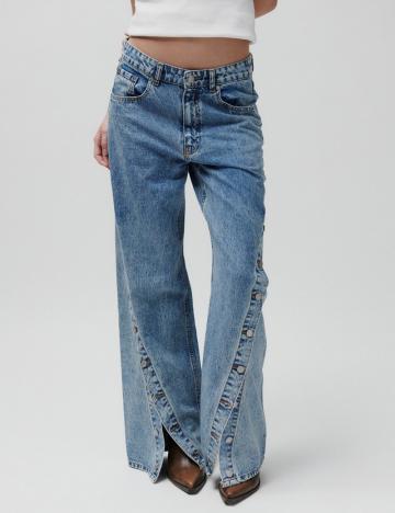 Клешеные джинсы