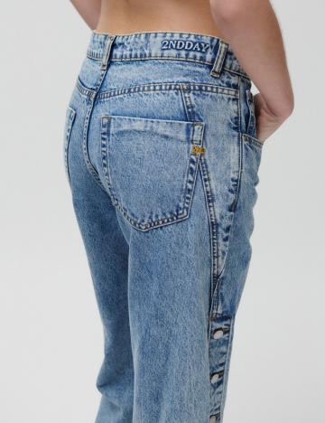 Клешеные джинсы