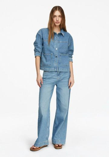 Клешеные джинсы