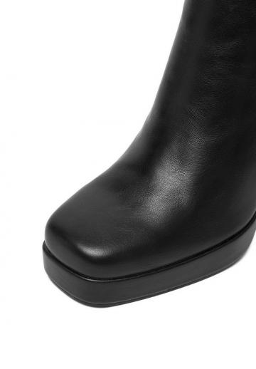 Высокие сапоги