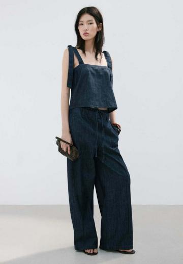 Блузка без рукавов
