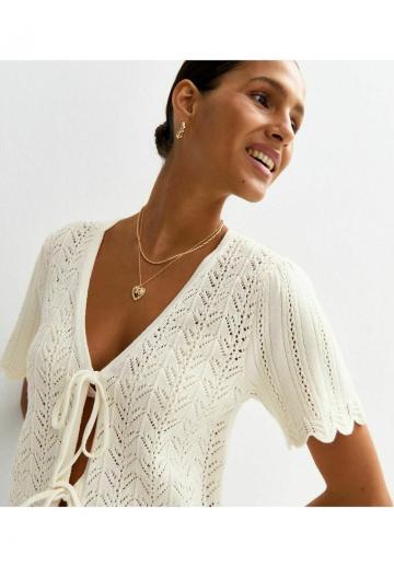 Вязаный жилет
