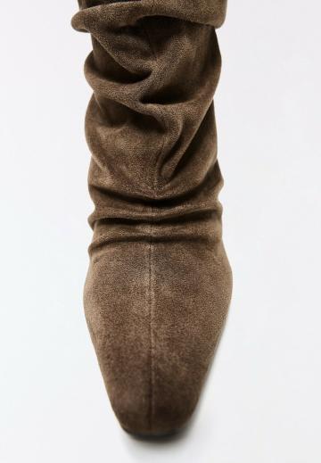 Высокие сапоги