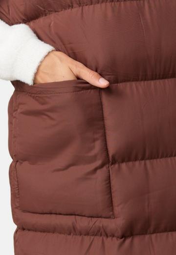 Длинный жилет