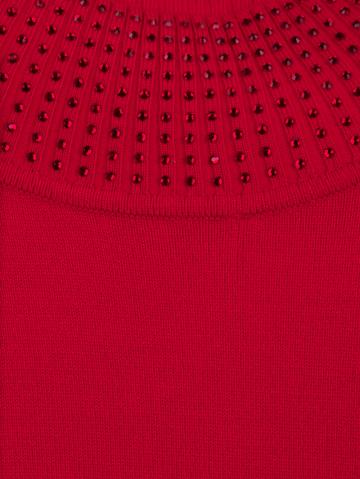 Вязаный пуловер