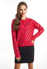 Жаккардовая вязаная кофта