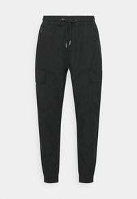 Брюки с накладными карманами Брюки с накладными карманами