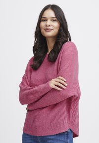 Длинный пуловер