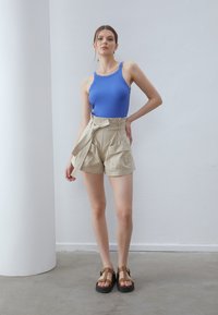 Длинный топ