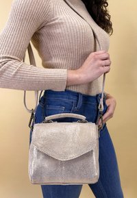 Кожаная сумка